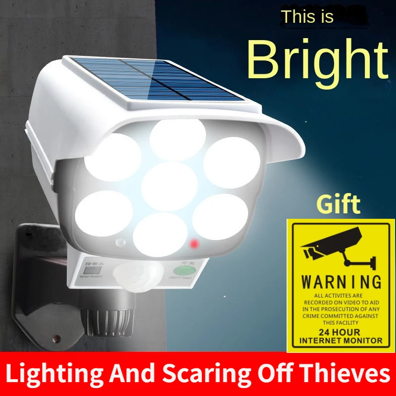 Home Security Cameras - 屋外ソーラーライトモーションセンサーセキュリティダミーカメラワイヤレスフラッドライトIP65防水77 LEDランプ3モード家庭菜園用